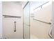 Modern bathroom features a walk-in shower with grab bars for accessibility at 1820 E Morten Ave # 119, Phoenix, AZ 85020