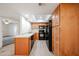 Efficient kitchen with ample cabinet space and a view into the dining area at 1820 E Morten Ave # 119, Phoenix, AZ 85020