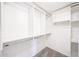 Spacious walk-in closet featuring custom shelving and ample storage space at 1820 E Morten Ave # 119, Phoenix, AZ 85020
