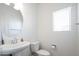 Powder room with a pedestal sink and simple, clean design at 18809 E Seagull Dr, Queen Creek, AZ 85142