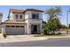 Charming two-story home with a well-manicured lawn and inviting front entrance at 18809 E Seagull Dr, Queen Creek, AZ 85142