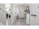 Bright foyer with white walls, grey floors, and decorative accents at 18809 E Seagull Dr, Queen Creek, AZ 85142