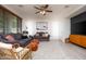 Bright living room with comfortable seating, ceiling fan and modern decor at 18809 E Seagull Dr, Queen Creek, AZ 85142