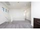 Open loft space with multiple windows and ample room for flexible use at 18809 E Seagull Dr, Queen Creek, AZ 85142
