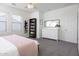 Bright main bedroom with carpet, plenty of natural light, and stylish furnishings at 18809 E Seagull Dr, Queen Creek, AZ 85142