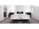 Well-appointed main bedroom features a plush bed, seating, and stylish decor at 18809 E Seagull Dr, Queen Creek, AZ 85142