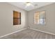 Bright bedroom with carpet and windows offering natural light at 1960 S Falcon Dr, Gilbert, AZ 85295