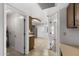 View through the hallway into the kitchen and dining area at 2064 S Farnsworth Dr # 43, Mesa, AZ 85209