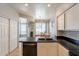 Efficient kitchen with granite countertops and modern appliances, perfect for cooking and entertaining at 2117 E Saltsage Dr, Phoenix, AZ 85048
