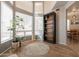 This living area features high windows with lots of natural light and a bookcase at 2117 E Saltsage Dr, Phoenix, AZ 85048