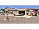 Outdoor living space with a refreshing pool, landscaped area, and a cozy patio at 2122 N Stapley Dr, Mesa, AZ 85203
