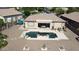 Aerial view of a private pool and patio area, perfect for outdoor entertaining and relaxation at 2122 N Stapley Dr, Mesa, AZ 85203