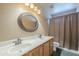 Bathroom features a dual sink vanity and decorative lighting at 2340 W Myrtle Dr, Chandler, AZ 85248
