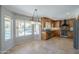 Gourmet kitchen with custom cabinets, stainless steel appliances, and a view of the backyard at 2340 W Myrtle Dr, Chandler, AZ 85248