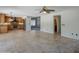 Open floor plan seamlessly connects the living room to the kitchen with tile flooring at 2340 W Myrtle Dr, Chandler, AZ 85248