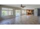 Bright living space with tile floors offers pool views and access to a gourmet kitchen at 2340 W Myrtle Dr, Chandler, AZ 85248