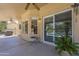 Covered patio overlooking a pool and spa with manicured landscaping at 2340 W Myrtle Dr, Chandler, AZ 85248