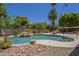 Custom-designed pool is surrounded by mature landscaping at 2340 W Myrtle Dr, Chandler, AZ 85248