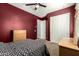 Bedroom features a closet, neutral paint, carpeting, and natural wood furnishings at 24013 N 165Th Ave, Surprise, AZ 85387