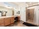 Beautiful primary bath featuring a walk-in shower and a spacious vanity area at 24013 N 165Th Ave, Surprise, AZ 85387
