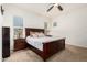Spacious main bedroom featuring a dark wood bedroom set and neutral decor at 24013 N 165Th Ave, Surprise, AZ 85387