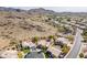 A sprawling desert community nestled at the base of scenic mountains offers a tranquil and picturesque setting at 2422 E Rockledge Rd, Phoenix, AZ 85048