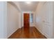 Inviting foyer features hardwood floors and a view of the front door at 2422 E Rockledge Rd, Phoenix, AZ 85048