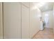Spacious laundry room with washer, dryer, overhead cabinets, and lots of storage at 2422 E Rockledge Rd, Phoenix, AZ 85048
