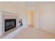 Inviting living room featuring a tile fireplace and door perfect for relaxing evenings at home at 2422 E Rockledge Rd, Phoenix, AZ 85048