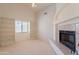 Inviting living room with built-in bookshelves and a cozy fireplace, ideal for Gathering gatherings at 2422 E Rockledge Rd, Phoenix, AZ 85048