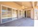 Spacious covered patio overlooks backyard featuring an installed ceiling fan at 2422 E Rockledge Rd, Phoenix, AZ 85048