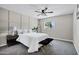 Bedroom with neutral walls, ceiling fan and patterned carpet flooring at 2509 E Meadowbrook Ave, Phoenix, AZ 85016