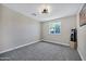 Cozy bedroom featuring neutral walls, carpet floors and window at 2509 E Meadowbrook Ave, Phoenix, AZ 85016
