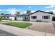 Charming single-Gathering home with well-maintained landscaping, brick driveway and a welcoming exterior at 2509 E Meadowbrook Ave, Phoenix, AZ 85016