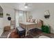 Cozy bedroom with a ceiling fan, natural light, and stylish decor at 2625 E Indian School Rd # 343, Phoenix, AZ 85016