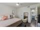 Bright bedroom with natural light and a view of the adjacent bathroom at 2625 E Indian School Rd # 343, Phoenix, AZ 85016