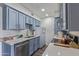 Well-equipped kitchen featuring stainless steel appliances, ample counter space, and stylish cabinetry at 2625 E Indian School Rd # 343, Phoenix, AZ 85016
