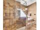 Beautiful bathroom featuring a step-in shower, jacuzzi tub, and tiled floors at 2699 E Claxton Rd, Gilbert, AZ 85297