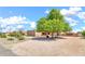 Charming single-story home with a well-maintained yard and mature trees creating a welcoming curb appeal at 2699 E Claxton Rd, Gilbert, AZ 85297