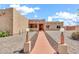 Front exterior of a single story home with long walkway and desert landscaping at 2699 E Claxton Rd, Gilbert, AZ 85297