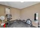 Functional home gym area with weightlifting equipment, creating a dedicated workout space within the residence at 2699 E Claxton Rd, Gilbert, AZ 85297