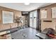 Well-equipped home gym featuring a treadmill, weights, and a TV, providing a convenient fitness space at 2699 E Claxton Rd, Gilbert, AZ 85297