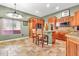Kitchen featuring stainless steel appliances, granite counters, and wooden cabinets at 2699 E Claxton Rd, Gilbert, AZ 85297