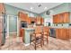 Kitchen featuring stainless steel appliances, granite counters, and wooden cabinets at 2699 E Claxton Rd, Gilbert, AZ 85297
