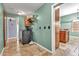 Convenient laundry room with modern washer and dryer, tiled floor, storage, and plenty of space at 2699 E Claxton Rd, Gilbert, AZ 85297