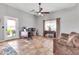 Comfortable home office area with tile flooring, desk space, and natural light at 2699 E Claxton Rd, Gilbert, AZ 85297