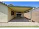 Covered back patio with low maintenance landscaping, perfect for outdoor living and entertaining at 3011 W Salter Dr, Phoenix, AZ 85027