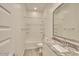 Bathroom featuring a granite vanity and a shower-tub combo at 31570 N 123Rd Ln, Peoria, AZ 85383