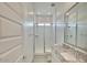 Bright bathroom with a glass shower and granite vanity at 31570 N 123Rd Ln, Peoria, AZ 85383