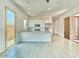 Kitchen area with granite counters, stainless steel appliances and breakfast bar seating at 31570 N 123Rd Ln, Peoria, AZ 85383